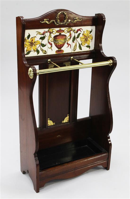 A late Victorian walnut and brass mounted umbrella stand, W.1ft 8in.